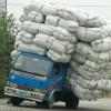 truck overloaded and tipping