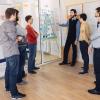 Scrum team participating in a daily standup meeting